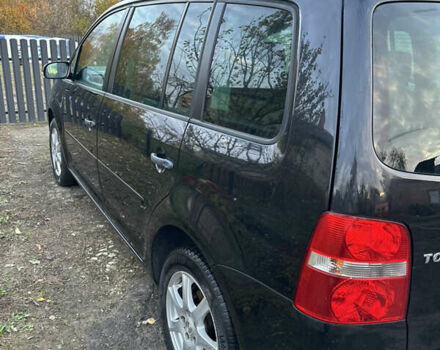 Чорний Фольксваген Туран, об'ємом двигуна 1.6 л та пробігом 295 тис. км за 5700 $, фото 3 на Automoto.ua