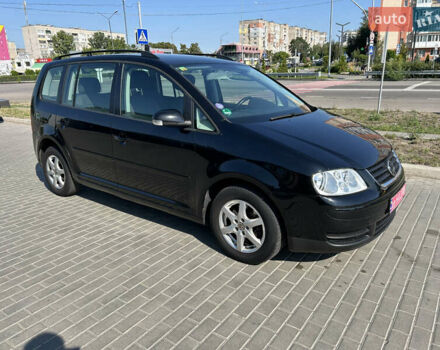 Черный Фольксваген Туран, объемом двигателя 1.6 л и пробегом 220 тыс. км за 5900 $, фото 16 на Automoto.ua