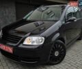 Черный Фольксваген Туран, объемом двигателя 1.6 л и пробегом 219 тыс. км за 5399 $, фото 1 на Automoto.ua