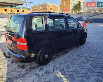 Черный Фольксваген Туран, объемом двигателя 1.6 л и пробегом 219 тыс. км за 5850 $, фото 7 на Automoto.ua