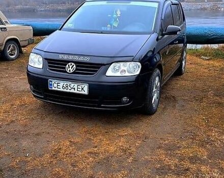 Черный Фольксваген Туран, объемом двигателя 1.9 л и пробегом 385 тыс. км за 5800 $, фото 1 на Automoto.ua