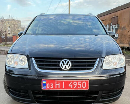 Черный Фольксваген Туран, объемом двигателя 1.6 л и пробегом 229 тыс. км за 6450 $, фото 18 на Automoto.ua