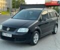 Черный Фольксваген Туран, объемом двигателя 1.6 л и пробегом 265 тыс. км за 5300 $, фото 1 на Automoto.ua