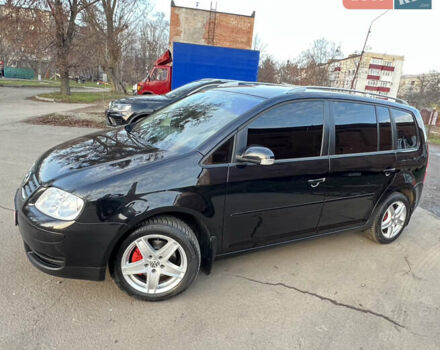 Черный Фольксваген Туран, объемом двигателя 1.6 л и пробегом 229 тыс. км за 6450 $, фото 16 на Automoto.ua