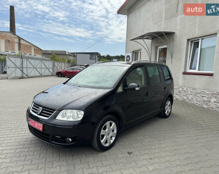 Черный Фольксваген Туран, объемом двигателя 1.98 л и пробегом 188 тыс. км за 4600 $, фото 4 на Automoto.ua