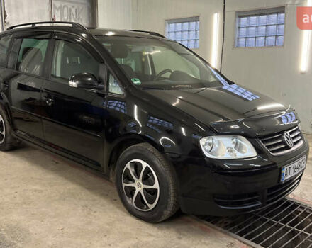 Черный Фольксваген Туран, объемом двигателя 1.9 л и пробегом 419 тыс. км за 5900 $, фото 1 на Automoto.ua