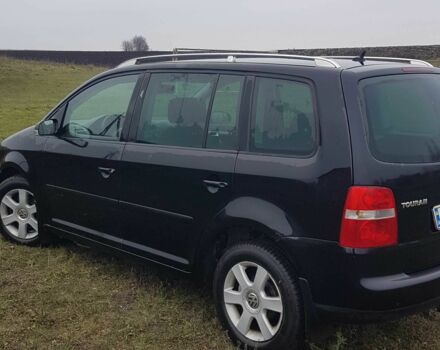 Черный Фольксваген Туран, объемом двигателя 2 л и пробегом 224 тыс. км за 4500 $, фото 3 на Automoto.ua