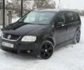 Чорний Фольксваген Туран, об'ємом двигуна 0 л та пробігом 321 тис. км за 2800 $, фото 1 на Automoto.ua