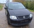 Черный Фольксваген Туран, объемом двигателя 1.6 л и пробегом 205 тыс. км за 5650 $, фото 1 на Automoto.ua