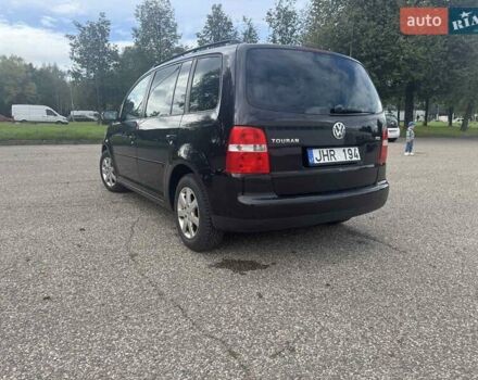Фольксваген Туран 2005 в Житомире на Automoto.ua Черный Фольксваген Туран, объемом двигателя 1.6 л и пробегом 186 тыс. км за 6950 $, фото 3 на Automoto.ua