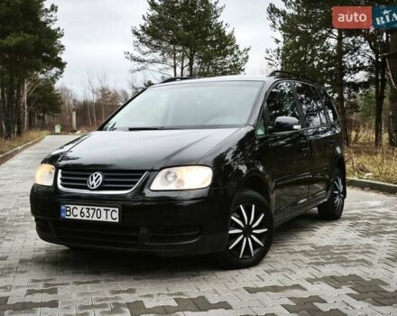 Черный Фольксваген Туран, объемом двигателя 2 л и пробегом 321 тыс. км за 5500 $, фото 7 на Automoto.ua