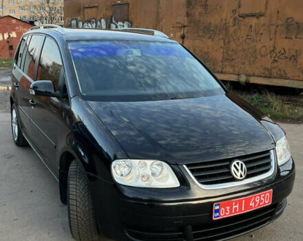 Черный Фольксваген Туран, объемом двигателя 1.6 л и пробегом 229 тыс. км за 6450 $, фото 5 на Automoto.ua