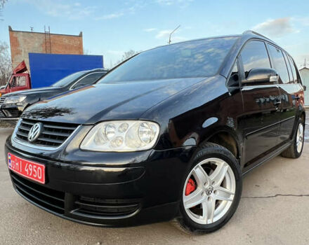 Черный Фольксваген Туран, объемом двигателя 1.6 л и пробегом 229 тыс. км за 6450 $, фото 17 на Automoto.ua