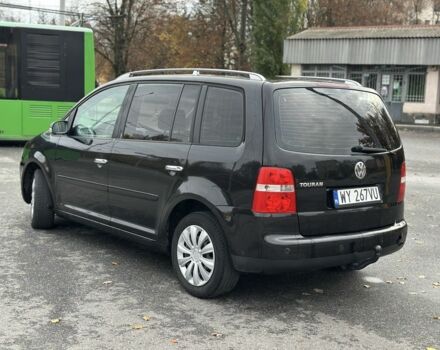 Фольксваген Туран 2005 в Харькове на Automoto.ua Черный Фольксваген Туран, объемом двигателя 0 л и пробегом 123 тыс. км за 2700 $, фото 1 на Automoto.ua