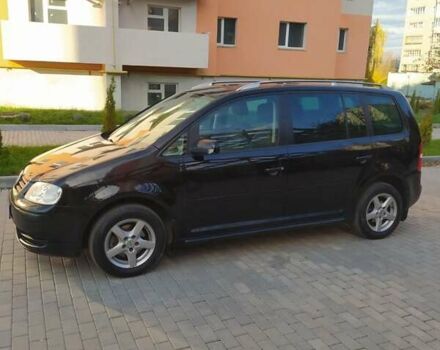 Черный Фольксваген Туран, объемом двигателя 1.6 л и пробегом 283 тыс. км за 5200 $, фото 16 на Automoto.ua