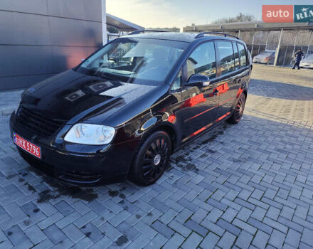 Черный Фольксваген Туран, объемом двигателя 1.6 л и пробегом 219 тыс. км за 5850 $, фото 2 на Automoto.ua