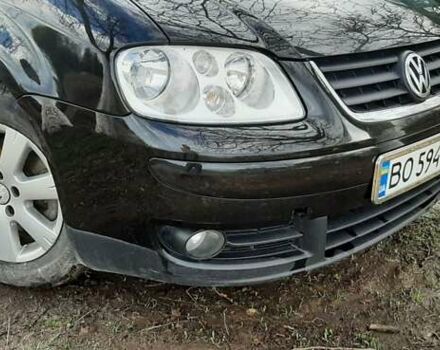 Черный Фольксваген Туран, объемом двигателя 1.9 л и пробегом 280 тыс. км за 6500 $, фото 2 на Automoto.ua