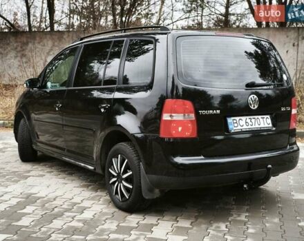 Черный Фольксваген Туран, объемом двигателя 2 л и пробегом 321 тыс. км за 5500 $, фото 5 на Automoto.ua