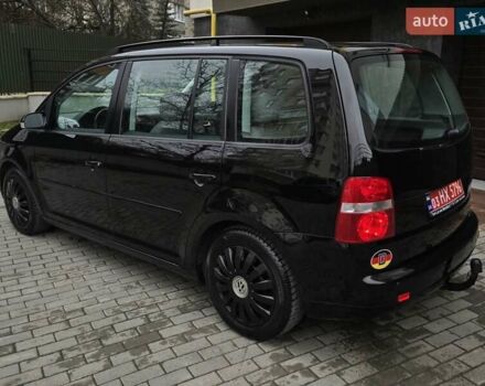 Черный Фольксваген Туран, объемом двигателя 1.6 л и пробегом 219 тыс. км за 5399 $, фото 5 на Automoto.ua