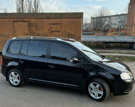 Черный Фольксваген Туран, объемом двигателя 1.6 л и пробегом 229 тыс. км за 6450 $, фото 7 на Automoto.ua