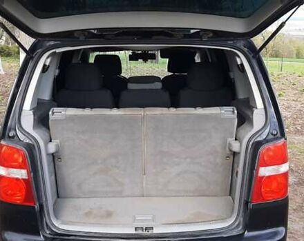 Черный Фольксваген Туран, объемом двигателя 1.9 л и пробегом 280 тыс. км за 6500 $, фото 9 на Automoto.ua