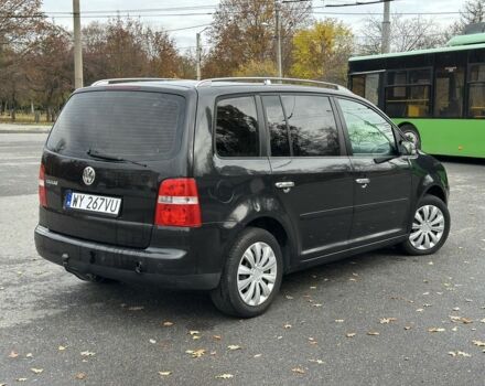 Фольксваген Туран 2005 в Харькове на Automoto.ua Черный Фольксваген Туран, объемом двигателя 0 л и пробегом 123 тыс. км за 2700 $, фото 2 на Automoto.ua