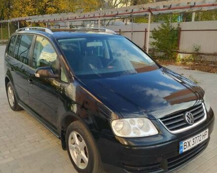 Черный Фольксваген Туран, объемом двигателя 1.6 л и пробегом 283 тыс. км за 5200 $, фото 5 на Automoto.ua