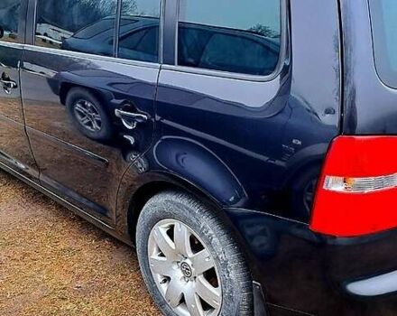 Черный Фольксваген Туран, объемом двигателя 1.9 л и пробегом 385 тыс. км за 5800 $, фото 11 на Automoto.ua