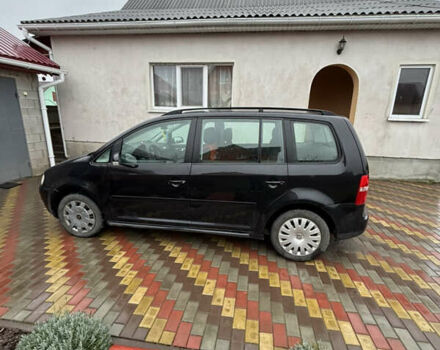 Черный Фольксваген Туран, объемом двигателя 1.97 л и пробегом 316 тыс. км за 5700 $, фото 6 на Automoto.ua