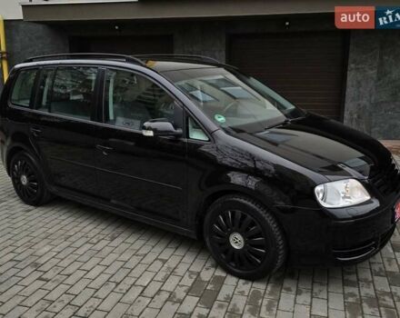 Черный Фольксваген Туран, объемом двигателя 1.6 л и пробегом 219 тыс. км за 5399 $, фото 12 на Automoto.ua
