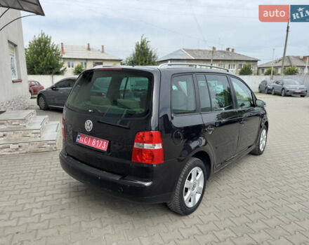 Черный Фольксваген Туран, объемом двигателя 1.98 л и пробегом 188 тыс. км за 4600 $, фото 14 на Automoto.ua