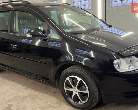 Черный Фольксваген Туран, объемом двигателя 1.9 л и пробегом 419 тыс. км за 5900 $, фото 13 на Automoto.ua