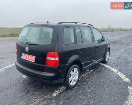 Черный Фольксваген Туран, объемом двигателя 1.6 л и пробегом 198 тыс. км за 6800 $, фото 9 на Automoto.ua
