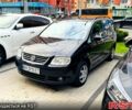Чорний Фольксваген Туран, об'ємом двигуна 2 л та пробігом 190 тис. км за 6600 $, фото 1 на Automoto.ua