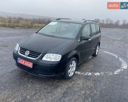 Черный Фольксваген Туран, объемом двигателя 1.6 л и пробегом 198 тыс. км за 6800 $, фото 14 на Automoto.ua