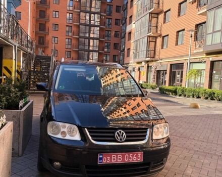 Черный Фольксваген Туран, объемом двигателя 1.6 л и пробегом 190 тыс. км за 6700 $, фото 1 на Automoto.ua