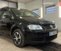 Черный Фольксваген Туран, объемом двигателя 1.9 л и пробегом 419 тыс. км за 5900 $, фото 1 на Automoto.ua