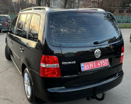 Черный Фольксваген Туран, объемом двигателя 1.6 л и пробегом 229 тыс. км за 6450 $, фото 12 на Automoto.ua