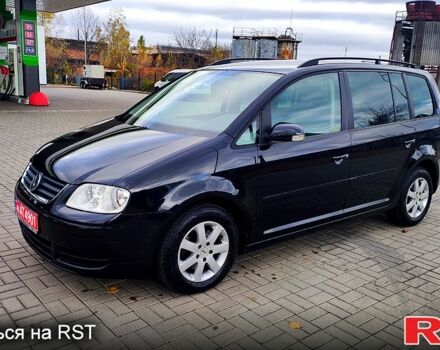 Фольксваген Туран 2005 в Житомире на Automoto.ua Черный Фольксваген Туран, объемом двигателя 1.6 л и пробегом 186 тыс. км за 6950 $, фото 6 на Automoto.ua