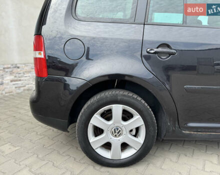 Черный Фольксваген Туран, объемом двигателя 1.98 л и пробегом 188 тыс. км за 4600 $, фото 16 на Automoto.ua