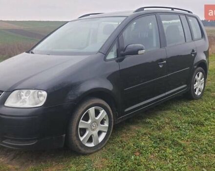 Черный Фольксваген Туран, объемом двигателя 1.6 л и пробегом 200 тыс. км за 5500 $, фото 4 на Automoto.ua