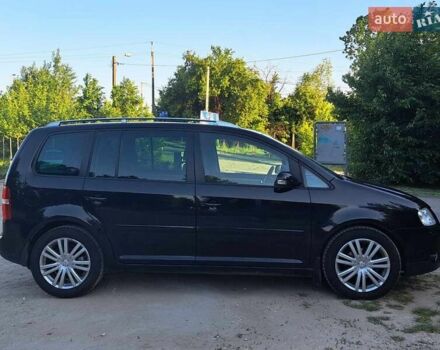 Чорний Фольксваген Туран, об'ємом двигуна 1.97 л та пробігом 291 тис. км за 7000 $, фото 2 на Automoto.ua