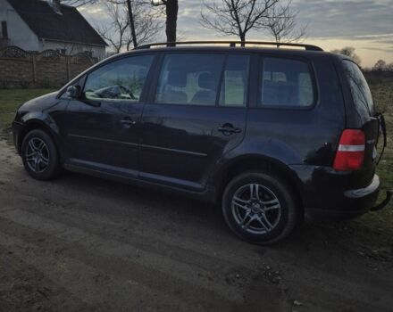 Черный Фольксваген Туран, объемом двигателя 1.9 л и пробегом 217 тыс. км за 2550 $, фото 5 на Automoto.ua