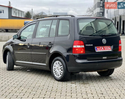 Черный Фольксваген Туран, объемом двигателя 1.6 л и пробегом 249 тыс. км за 5999 $, фото 15 на Automoto.ua