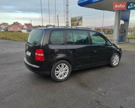 Черный Фольксваген Туран, объемом двигателя 2 л и пробегом 301 тыс. км за 6700 $, фото 14 на Automoto.ua