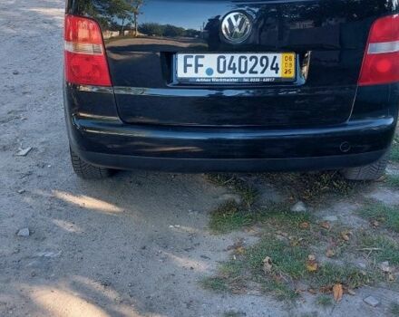 Черный Фольксваген Туран, объемом двигателя 1.6 л и пробегом 238 тыс. км за 5900 $, фото 2 на Automoto.ua