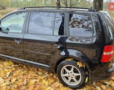 Черный Фольксваген Туран, объемом двигателя 1.39 л и пробегом 278 тыс. км за 5200 $, фото 4 на Automoto.ua