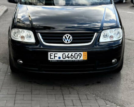 Черный Фольксваген Туран, объемом двигателя 1.6 л и пробегом 190 тыс. км за 6999 $, фото 63 на Automoto.ua