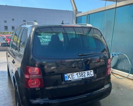 Черный Фольксваген Туран, объемом двигателя 1.6 л и пробегом 268 тыс. км за 5700 $, фото 1 на Automoto.ua