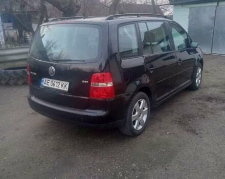 Черный Фольксваген Туран, объемом двигателя 1.6 л и пробегом 280 тыс. км за 5500 $, фото 4 на Automoto.ua